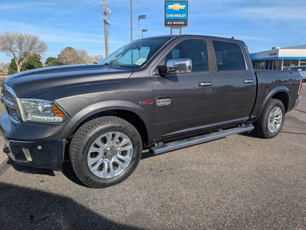 2015 RAM 1500 Laramie Longhorn in Gray — front three-quarter view