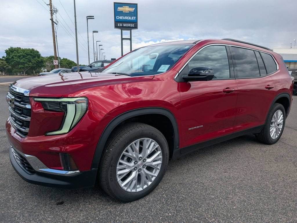 2026 GMC Acadia Elevation in Volcanic Red Tintcoat — front three-quarter view