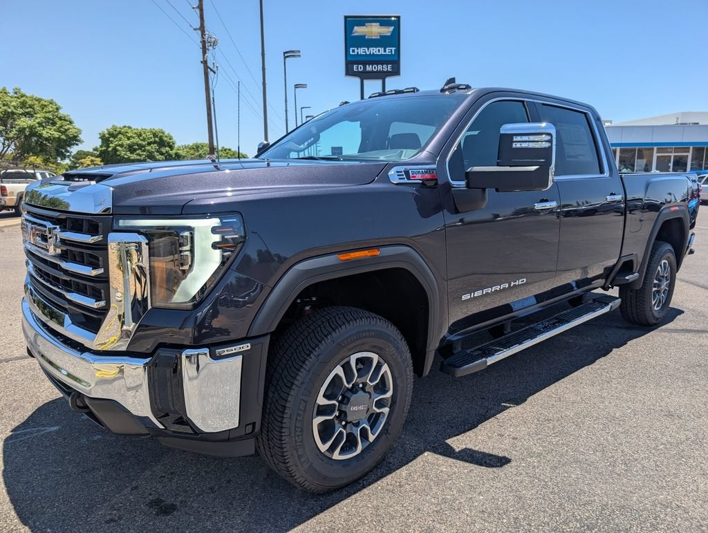 2026 GMC Sierra 2500 HD SLT in Titanium Rush Metallic — front three-quarter view