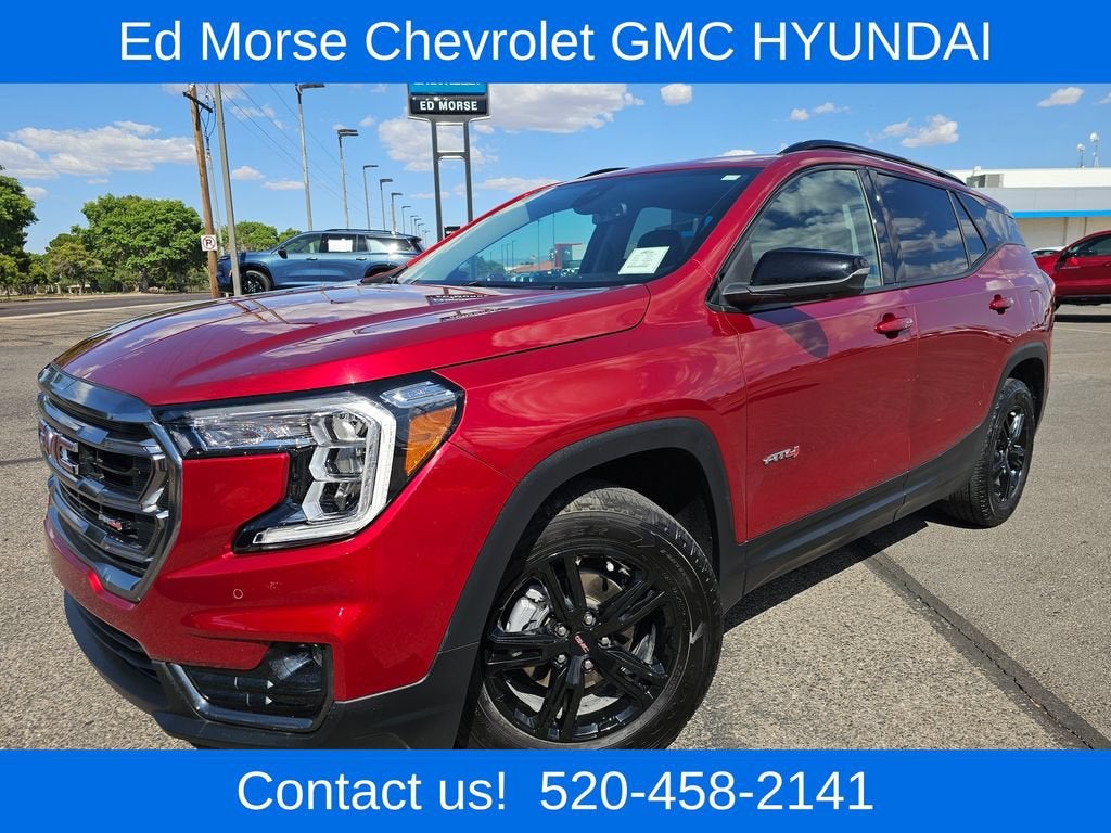 2024 GMC Terrain AT4 in Volcanic Red Tintcoat — front three-quarter view